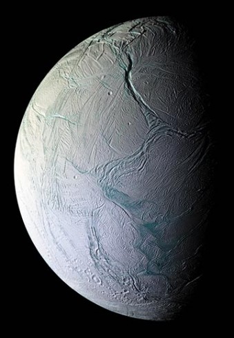 Cracks and folds on the ice-covered Saturnian moon Enceladus